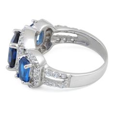 Top of ring height: 1.8mm

 Top of ring width: 2.8mm


Shank width: 3.1mm 




Stone material: blue & clear cubic zirconia



Center stone size: 8mm 



Stone shape: cushion cut (center) & round



Center stone carat weight: 3.1 ct.



Total number of CZ stones: 42



Stone setting: prong setting





Metal: 925 sterling silver



Plating: rhodium plated


Finish: high polish Three Stone Engagement Rings Halo, Three Stone Sapphire Ring, Stone Material, Stone Setting, Cz Ring, Blue Sapphire Rings, Sapphire Stone, Halo Engagement Ring, Cz Stone