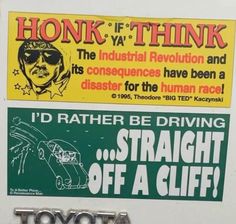 two stickers on the side of a truck that say, i'd rather be driving straight off a cliff?