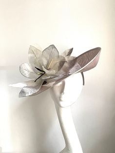 Silver grey saucer disc hat Silver Saucer Disc Hat will be an amazing accessory to compliment your outfit. It's very elegant and original. Silver saucer disc hat will fit the average head size. Its made from a silk-covered headband attached to a sinamay saucer base on which sits bunch of organza flowers. Enjoy your special day with this beautiful headpiece and please have a look at my other fascinators and hats in my shop. Kristine xx https://www.etsy.com/uk/shop/FashionistaKrista Silver Wide Brim Adjustable Costume Hat, Silver Wide Brim Costume Hat With Adjustable Fit, Silver Adjustable Wide Brim Costume Hat, Silver Brimmed Party Hat, Silver Wide Brim Costume Hat For Party, High Crown Silver Hat For Party, Silver High Crown Hat For Party, Elegant Silver Hat For Kentucky Derby, Silver Adjustable Fascinator For Church