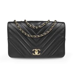 Chanel 'Statement Flap' handbag in black chevron quilted lambskin leather with soft gold hardware. Features a turn-lock logo closure, an adjustable small chain strap, and a black canvas lined interior with a slip and zip pocket. Circa 2019. Includes dust bag. Brand = Chanel Condition = 8/10, Very good, light dents to exterior leather Dimensions = 10" x 7" x 3" Strap Drop = 10.5"-19.5 Material = Leather Hardware = Soft Gold Date Code = 28XXXXXX SKU = 23588-1 Timeless Quilted Bag For Formal Occasions, Timeless Quilted Formal Bag, Timeless Black Quilted Shoulder Bag, Timeless Quilted Black Shoulder Bag, Timeless Quilted Business Bag, Luxury Quilted Wallet On Chain For Evening, Black Quilted Flap Bag For Formal Occasion, Timeless Quilted Business Shoulder Bag, Timeless Quilted Shoulder Bag For Business