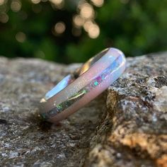 Stunning 6mm wide DiamondCast™ Unicorn poop with opal inlay. This wedding band is custom-made for you right here in the USA by skilled artisans who have an uncompromising passion for quality and style. The finish on this ring is polished with a rounded profile. *6mm DiamondCast™ Unicorn Poop with opal inlay *Available in sizes 4-15.5 in whole, half, and quarter size increments *Handcrafted by Skilled Artisans SKU: COB-6F-DC UP-11.5G-PURP OPAL About DiamondCast: DiamondCast™ Blanks are made with Opal Ring With Inlay Perfect For Gifts, Opal Inlay Ring Gift, Gift Opal Inlay Ring, Cobalt Wedding, Unicorn Poop, Ring Opal, Custom Ring, Opal Ring, Lovely Jewellery