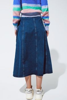 Step into a chic blend of style and comfort with our Maxi Wrap Denim Skirt. Made with a premium blend of 75% Cotton, 15% Viscose, and 10% Polyester, this skirt provides the perfect balance of softness, durability, and structure. The wrap design offers a flattering silhouette and adds a touch of elegance to the ruggedness of denim. Designed for a relaxed fit, this skirt falls gracefully to a full length, allowing you to flaunt its timeless style on daily occasions. The high-waist rise accentuates Chic Lined Denim Skirt, Denim Lined Skirt In Dark Wash, Chic High Waist Relaxed Denim Skirt, Chic Denim Skirt With Pockets, Dark Wash Relaxed Midi Denim Skirt, Dark Wash Denim Lined Skirt, Dark Wash Denim Skirt With Lining, Dark Wash Relaxed Denim Midi Skirt, Relaxed Dark Wash Denim Midi Skirt