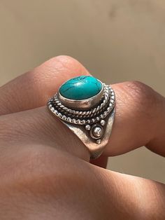 Vintage 1990s Solid Silver Turqoise Set  Oval shape Bohemian ladies Ring.  Condition of the ring is good considering it's vintage age there are no visible deep scratches to the ring . An elegant chunky  stunning piece.  The ring is hallmarked.'925' as shown in pictures. the ring shape is oval with rope pattern edging around the turquoise  , there is a rope like design around the stone.   Ring size - UK M and US 6 and a quarter  All of our jewellery is inspected, cleaned/ polished to a high stand Bohemian Turquoise Oval Ring, Vintage Turquoise Ring With Oval Cabochon, Vintage Turquoise Oval Ring, Bohemian Style Adjustable Oval Emerald Ring, Bohemian Oval Emerald Ring Adjustable, Vintage Turquoise Oval Cabochon Ring, Vintage Oval Turquoise Cabochon Ring, Vintage Turquoise Open Ring, Vintage Oval Cabochon Turquoise Ring