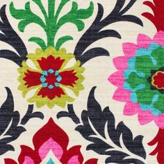 a colorful floral design on white fabric