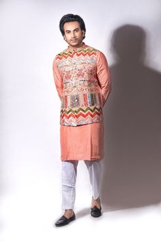 Kurta pajama jacket set beautifully embroidered silk jacket paired with silk kurta pajama Spring Chanderi Nehru Jacket With Resham Embroidery, Spring Nehru Jacket With Resham Embroidery In Chanderi, Spring Resham Embroidery Chanderi Nehru Jacket, Nehru Jacket With Chikankari Embroidery In Chanderi Fabric, Designer Chikankari Embroidery Sherwani For Spring, Spring Bandhgala Chanderi Straight Kurta, Spring Chanderi Bandhgala Straight Kurta, Spring Sherwani With Resham Embroidery, Straight Kurta Style, Spring Floral Embroidered Straight Kurta Bandhgala