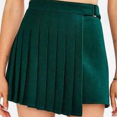 Pleat-Front Mini Skirt From J.O.A. Cozy Wool Cut Short In A Draped Silhouette Featuring A Pleated Front And Buckled High-Rise Waist. Size Medium Dark Green Nwt Perfect Condition - Length: ~15” (Laying Flat) - Width: ~15” (Laying Flat) - Wool, Polyester - Model Is 5'9" And Wearing A Medium - Measurements Taken From Size Medium Winter Pleated Skirted Skort, High-waisted Pleated Skort For Winter, High Waist Pleated Skort For Winter, Green Mini Length Fall Skort, Green Pleated Winter Skirt, Short Green Skirt For Fall, Green Short Skirt For Fall, Green Mini Skirt For Fall, Green High Waist Tennis Skirt