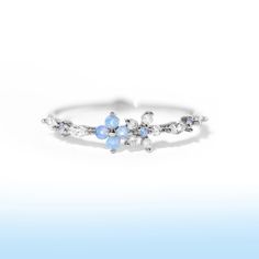 Take beauty wherever you go in the Blue Blossom Garden Ring. This design has become a GC favorite and is here to stay! You'll get lost in the stunning and calming baby blue and milky white cubic zirconia stones. Garden Ring, Blue Blossom, Blossom Garden, Milky White, One Image, Blue Rings, 18k Rose Gold, Rose Gold Plates, Rose Gold Ring