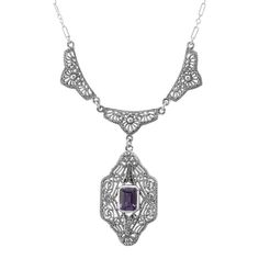 This is a true to period art deco style Sterling Silver Amethyst Filigree Necklace measures 19 inches in length. The filigree Amethyst pendant portion measures approx. 1 1/4 inches H x 3/4 inches W. Total hanging length of pendant is approx. 1 7/8 inches. The piece is absolutely beautiful. The necklace also comes with an easy-to-use strong trigger clasp (lobster claw). This is a great example of a period piece and would be a great addition to your Art Deco / Victorian collection.  Thanks for looking and if you have any questions, always feel free to ask :). fn215am Luxury Art Deco Filigree Necklace, Formal Art Nouveau Necklace, Art Deco Gemstone Necklace For Anniversary, Art Deco Oval Necklaces, Silver Art Nouveau Necklace For Anniversary, Formal Art Deco Oval Necklace, Formal Oval Art Deco Necklace, Art Deco Filigree Necklace As Gift, Art Deco Filigree Necklace Gift