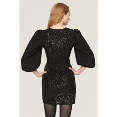 Black sequins (97% Polyester, 3% Spandex). Sheath. Long sleeves. Crewneck. Back zipper closure. 35" from shoulder to hemline. Imported. Sequined Knee-length Mini Dress For Holiday Party, Winter Knee-length Sequined Mini Dress, Sequined Bodycon Dress For Evening In Fall, Fitted Contrast Sequin Mini Dress For Fall, Evening Bodycon Dress With Sequins For Fall, Fitted Mini Dress With Contrast Sequin For Fall, Fall Evening Bodycon Dress With Sequins, Knee-length Contrast Sequin Dress For Night Out, Glamorous Fall Dress With Back Zipper