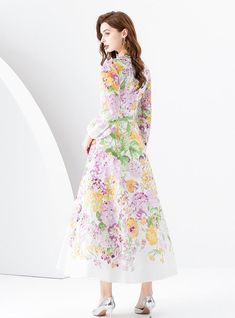 "Bloom into elegance with this pastel-hued masterpiece, a dress that intertwines the gentleness of a spring garden with the grace of high fashion. Boasting an ethereal array of floral designs, this piece is a sartorial tribute to the tender beauty of nature. Its full-length sleeves and high mandarin collar lend a vintage touch, while the fitted waist—highlighted by a delicate belt—creates a flattering silhouette. Crafted from a lightweight, flowing fabric, the dress moves with a dreamlike quality. The soft palette of pinks, greens, and lilacs paints a picture of serene loveliness, perfect for garden parties, springtime weddings, or simply when one wishes to carry the freshness of spring wherever they go." Fabric name: chiffonPattern: printingSkirt length: long skirtSkirt type: flounce skir Flowy Floral Midi Dress For Garden Party, Spring Floral Embroidered A-line Maxi Dress, Pink A-line Maxi Dress For Spring, Spring Garden Party Maxi Dresses, Feminine Floral Print Spring Dresses, Feminine Spring Chiffon Maxi Dress, Feminine Spring Maxi Dress For Garden Party, Feminine Maxi Dress For Garden Party In Spring, Elegant Floral Print Spring Dress