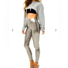 Shiny Faux Leather Metallic Legging Pants With Elastic Waistband . New With Tags. High Rise. Fun For A Night Out, A Festival Or Like Shown Here With Crop Sweatshirt. #Halloween #Festival #Costume #Silver #Disco #Metallic #Punk #Rock Metallic Bottoms For Night Out In Winter, Metallic Bottoms For Winter Night Out, Trendy Metallic Leggings For Night Out, Trendy Metallic Leggings For Fall, Metallic Fitted Bottoms For Winter, Trendy Winter Leggings For Streetwear, Trendy Winter Streetwear Leggings, High Waist Leggings For Fall Streetwear, Trendy Streetwear Leggings For Fall