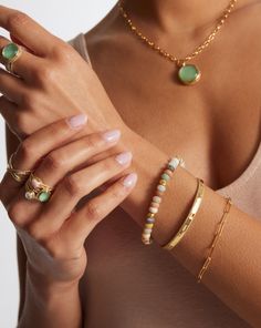 Your layering base is covered with this natural amazonite beaded bracelet. Pair this Bali jewelry design with your favorite gold cuffs and chain bracelets. Amazonite Bead Bracelet, Anna Beck, Bali Jewelry, Pale Aqua, Gold Cuffs, Ring Pendant Necklace, Green Quartz, Slate Grey, Engraved Items