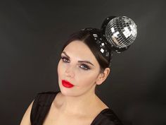 Gorgeous bright fascinator with a disco ball. Will be a great addition to your Christmas or New Year's costume, festival, disco party or space party. Will be a bright addition to the photo shoot. The height of the composition is 4 inches. 100% designed and handmade by our designers ( SETA Design studio in Kyiv). It will be securely packed in a box. Feel free to contact us if you have any questions. We accept return. Contact us within 3 days of delivery. Delivery of goods is returned within 7 day Disco Ball Hat, Disco Mermaid, Boots Inspiration, Christmas Fascinator, Halloween Brunch, Party Mirror, Ball Mirror, Disco Ball Mirror, Festival Headband