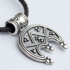 "Slavic Moon symbol/ Pagan Wiccan necklace/ Norse Viking jewelry with meaning Lunula pendant. Celtic women's amulet. Stamped 925 Sterling Silver Lunula (or Lunitsa) is a powerful female charm. Lunula (or Lunitsa) is an ancient Slavic and Viking female amulet. It symbolizes fertility, happy life and good luck. As the Moon has been always associated with female nature, the Lunula pendant is able to connect your female energy with lunar cycle. Lunula mascot is a powerful talisman against evil spiri Bohemian Sterling Silver Pendant Charm Necklaces, Symbolic Good Luck Jewelry With Coin Pendant, Symbolic Round Large Pendant Jewelry, Good Luck Amulet Jewelry With Round Pendant, Adjustable Sterling Silver Medallion Necklaces, Adjustable Sterling Silver Coin Pendant Jewelry, Adjustable Sterling Silver Coin Pendant, Amulet Style Coin Pendant Jewelry, Spiritual Moon Charm Pendant Jewelry