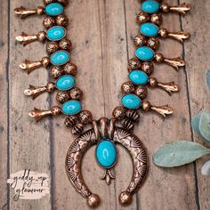 Pair this beauty with your favorite jeans and tee & go rock the world! Necklace measures 14 inches long with a 4 inch adjustable chain. SKU#: 1203-1933 Trendy Boutique Clothing, World Necklace, Giddy Up Glamour, Squash Blossom Necklace, Squash Blossom, Early Spring Outfits, Turquoise Stones, Current Fashion Trends, Petite Outfits