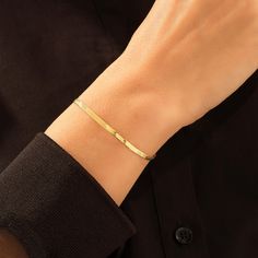 We are excited to share with you our latest design. You can use this bracelet to create a chic everyday style. This bracelet would be a wonderful way to express your love to your significant other loved ones. - Made in 14k Solid Gold- Chain Width, 2.86 mm / 0.11 inches - Chain Thickness, 0.39 mm / 0.01 inches - This product comes with iconic Norm Jewels gift box Gold Herringbone Chain, Gold Arm Band, Flat Snake Chain, Herringbone Bracelet, Italian Chain, Luxury Jewelry Brands, Herringbone Chain, Gold Armband, Snake Chain Bracelets