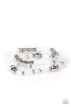 A mismatched assortment of glassy and opaque white beads joins white crystal-like and dainty silver accents along stretchy bands around the wrist, resulting in dreamy layers. Pink Bubbles, White Bracelets, Best Jewelry Stores, Paparazzi Accessories, Paparazzi Jewelry, White Crystal, Silver Accents, White Beads, One Set