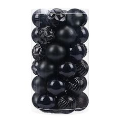 black balls are in a clear plastic container