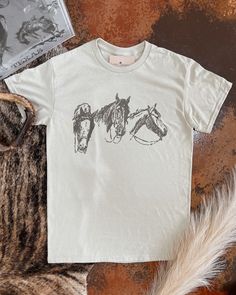 Printed on unisex fit Sand color Gildan t-shirt  Made to order, please allow up to 6 days for create time MADE TO ORDER JUST FOR YOU —FINAL SALE ITEM Horse T Shirt Design, Modesty Journey, Liberty Black Boots, Horse T Shirt, 3 Horses, Womens Hats, Moms Goals, Western Wear Outfits, Brand Ideas