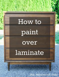 a sign that says how to paint over laminate on the side of a road