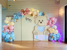 a teddy bear themed birthday party with balloons