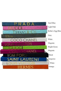 a stack of books sitting on top of each other in different colors and fonts