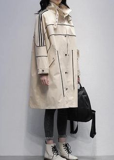 Casual Beige Outerwear With Stand Collar, Trendy Khaki Outerwear With Stand Collar, Oversized Khaki Outerwear With Stand Collar, Trendy Beige Outerwear With Zipper Closure, Spring Stand Collar Khaki Outerwear, Khaki Stand Collar Outerwear For Spring, Spring Khaki Outerwear With Stand Collar, Beige Outerwear With Zipper For Outdoor, Cream Stand Collar Outerwear For Fall