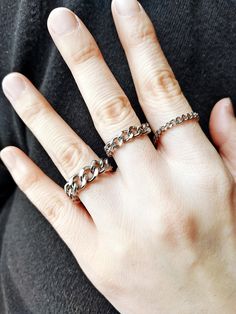 💖Discover the perfect blend of style and durability with our Silver Cuban Chain Ring, an exquisite piece designed for both men and women. 💖This chunky chain link ring, crafted from high-quality stainless steel, ensures a waterproof finish for everyday wear. Ideal for those who appreciate minimalist jewelry, it offers a dainty yet robust appeal, perfect for simply stacking or making a statement on its own.  💖Whether it's a thoughtful birthday gift for your best friend or a special statement piece for couples, this stackable ring, elevates any outfit with its elegant curb chain design.💖  🥰Our shop is committed to excellence, offering you a product that not only meets but exceeds your expectations.  🔆 EXCEPTIONAL CRAFTSMANSHIP: Each of our Jewelry is a masterpiece of detail and design, Silver Cuban Chain, Gold Chain Ring, Chain Link Ring, Link Ring, Gold Gift Boxes, Linking Rings, Chain Design, Ring For Men, Cuban Link Chain