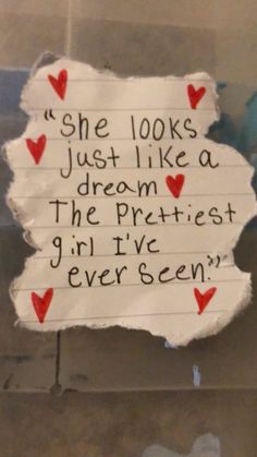 a piece of paper with writing on it that says she looks just like a dream the prettiest girl i've ever seen