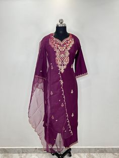 Purple Embroidered Silk Blend Straight Kurta with Trousers & Dupatta For Party /Festive / Wedding For Women Pakistani Salwar Kameez / Indian Wedding Dress / Plus Size Cotton Dress Traditional Indian Wear / Salwar Kameez Dupatta / Kurti Palazzo Set The set contains: 1 Kurta 1 Trousers 1 Dupatta Kurta: The purple Embroidered Silk Blend straight Kurta has a round neck design with embroidered details. The Kurta measures calf length and has straight hemline. It comes with one pockets.  Sleeve length :  3/4 Sleeves Palazzo : Solid palazzos has partially elasticated waistband and slip on closure .   Dupatta: Comes with a Dupatta .  Material : Kurta : Silk Blend Palazzo :  Silk Blend Dupatta : Chiffon Fabric Care : Hand wash Please see the size information below to choose a perfect size for yourse Embroidered Chinon Kurta For Wedding, Fitted Purple Embroidered Salwar Kameez, Fitted Purple Embroidered Fabric For Eid, Festive Fitted Embroidered Organza Fabric, Floral Embroidered Party Sets For Transitional Seasons, Chanderi Embroidered Sets For Reception, Festive Embroidered Salwar Kameez For Reception, Fitted Embroidered Dress With Zari Work For Diwali, Traditional Fitted Embroidered Dress For Reception