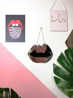 KISS ME lips mirror, our lush wall mirror is so fun and lightweight as it's made from Acrylic perspex. Perfect for adding a fun touch to any room in the modern home. Make a statement with these unique pieces designed by us at Doodlemoo. They hang at 12cms and come in a beautiful Eco black box. All our wall mirrors come beautifully wrapped in a black box making it perfect for a gift. These also come as a heart and lightning bolt, mirror silver or mirror gold Lips mirror measures 198X150mm Hang chain 120mm Lightweight and black at the back Posted in an A5 box Lips Mirror, Silver Wall Decor, Spiegel Gold, Gold Lips, Silver Walls, Mirror Silver, Unique Mirrors, Mirror Acrylic, Hanging Wall Mirror