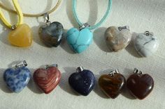 "These are multi-colored gemstone heart shaped healing chakra crystal quartz stone pendants. The pendants are 15 - 16 mm in size with 18\" leather cord necklaces with silver medal clasps. Each necklace has a two inch extension chain to allow you some flexibility in fit. You pick the color of your necklace!! These would make a beautiful present for Valentines Day or any time of the year. If you would like a chain necklace rather than a leather cord necklace just send me a message. I have a variet Heart-shaped Crystal Necklace With Natural Stones For Healing, Heart-shaped Natural Stone Crystal Necklace For Healing, Healing Heart-shaped Crystal Gemstone Necklace, Handmade Heart Crystal Necklaces For Healing, Handmade Heart-shaped Crystal Necklaces For Healing, Heart Pendant Crystal Necklace With Natural Stones, Handmade Heart-shaped Crystal Necklace For Healing, Heart Stone Necklace, Cord Necklaces