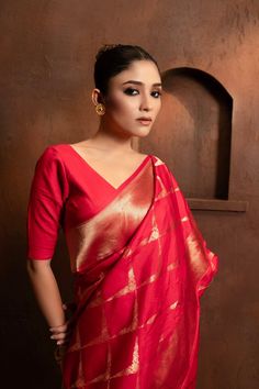 Indulge in luxury with our Handwoven Red Pure Katan by kora Silk Banarasi saree. Meticulously crafted using the timeless cutwork weaving technique, this saree exudes sophistication and exclusivity. Elevate your style with its rich texture and vibrant color, perfect for any special occasion. SKU:0001 Red Katan Silk Pre-draped Saree For Designer Wear, Red Cotton Silk Pre-draped Saree For Wedding, Red Cotton Silk Pre-draped Saree With Dupatta, Designer Red Pre-draped Saree With Self Design, Elegant Red Cotton Silk Dupatta, Designer Red Cotton Silk Blouse Piece, Red Formal Blouse With Traditional Drape, Festive Red Cotton Silk Pre-draped Saree, Red Cotton Silk Pre-draped Saree For Designer Wear