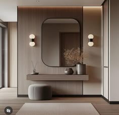 a bathroom with a mirror, stool and vase on the counter in front of it