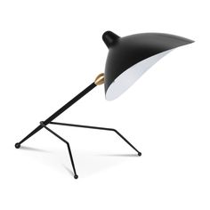 a black and white desk lamp with a wooden stand on it's legs, the light is turned off