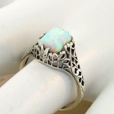 Vintage Estate Lab Created Cabochon Cut Opal Solitaire Filigree Ring. 925 Solid Sterling Silver. Stamped 925. Excellent Condition/Like New. Classic Cabochon Opal Ring For Anniversary, Classic White Cabochon Opal Ring, White Hallmarked Opal Ring Fine Jewelry, Classic Hallmarked White Opal Ring, Classic White Opal Ring, White Oval Victorian Opal Ring, Victorian White Oval Opal Ring, Classic Cabochon Opal Ring As Gift, Classic Cabochon Opal Ring Gift