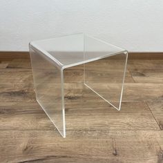 A small Lucite Acrylic Side Table Plexiglass Stand Coffee Table A clean, elegant and well preserved side table, from Germany supposedly from the 80's. The table is manufactured of massive (0.7 cm thick) bended acrylic plate. An iconic statement from the last century. Well kept, clean and in fully operational condition. All surfaces were carefully polished. Nevertheless there might be some tiny, almost invisible scratches available. Dimensions: Height : 31.5 cm / 12.4"  Width: 30 cm / 11.81" Dept Clear Side Table, Lucite Coffee Table, Acrylic Side Table, Lucite Coffee Tables, Cube Side Table, Petite Table, The 80's, Coffee And End Tables, Plexus Products