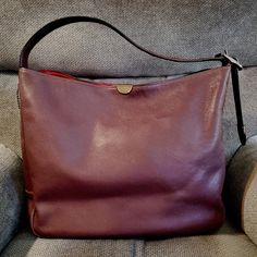 In Very Good Condition. Comes With Original Hangtag. There Are A Couple Marks On The Inside And One Slightly Lighter Spot Shown In The Last Photo. Its Hard To See. About 12" By 14" Oxblood Color, Its Hard, Coach 1941, Bags Coach, Purple Gray, Purple Grey, Coach Bags, A Couple, Bag Lady