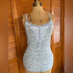 Vintage Rare Free People Ribbed Pointelle Henley Camisole In Indigo Floral Print With Lace Detail At The Neck And Snaps. Lace Trim Along The Neck And Spaghetti Straps. Slim Fit But Stretches Quite A Bit. Bust Stretches Up To 18” Approx. Absolutely Love This Style. New With Tags 100% Cotton Size Large Fitted Tank Strap Tops For Daywear, Fitted Tops With Tank Straps For Daywear, Blue Fitted Camisole With Scoop Neck, Fitted Tank Tops For Day, Free People Adella, Layered Cami, Indigo Floral, Babydoll Shirt, Black Cami Top