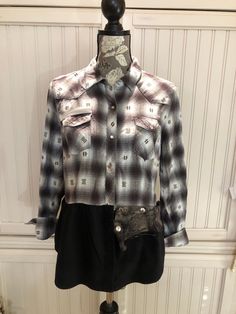 "This women's Small soft flannel shirt was upcycled by adding a men's shirt tail hem. Marrying the black men's large shirttail as a long gathered hem to this soft black and aqua plaid shirt gives it just the right amount of comfort and ease. The western style in the back yoke and pearl snap closure adds to the special feeling of the shirt.  The long sleeves have a triple pearl snap closure. The top pocket is trimmed with a light gray zipper loop so you can hang your sun glasses or readers and ke Fitted Long Sleeve Flannel Shirt For Winter, Fall Cotton Fitted Shirt, Fitted Cotton Shirt For Fall, Fitted Collared Flannel Shirt For Winter, Fitted Tops With Pockets For Fall, Western Long Sleeve Tops For Fall, Western Style Buttoned Tops For Fall, Plaid Relaxed Fit Shirt For Fall, Western Style Tops With Buttons For Fall