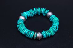 This is Santa Fe style bracelet, big sterling silver Native stamped beads with high quality natural turquoise. Want a hint of southwest Santa Fe, here it is. Turquoise stretch bracelet with native stamped sterling silver beads. All handcrafted by local native artisans with highest quality beads. Great for a man or a woman.  Turquoise Stretch Bracelet Santa Fe Bracelet Native Jewelry Unisex Jewelry Big Turquoise Beaded Bracelet A Living Stone All Native Americans believe that the earth is living Southwestern Silver Bracelets With Gemstone Beads, Southwestern Silver Bracelet With Gemstone Beads, Southwestern Turquoise Bracelets With Polished Beads, Southwestern Style Turquoise Bracelets With Polished Beads, Southwestern Style Turquoise Polished Beads Bracelet, Indigenous Design, Expensive Stones, Turquoise Hoop Earrings, Turquoise Hoops