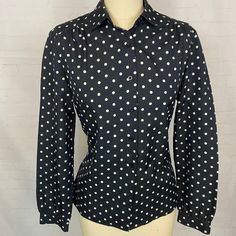 "Vintage 80s Black Polkadot Blouse Excellent condition black polyester polkadot blouse with gathered shoulder, slight puff sleeves and button front closure. Size 10, fits S-M Bust 34-38\" Waist 27-32\"" Retro Black Button-up Blouse, Fitted Polka Dot Shirt For Spring, Fitted Polka Dot Puff Sleeve Blouse, Polka Dot Long Sleeve Blouse For Work, Fitted Polka Dot Collared Shirt, Fitted Polka Dot Blouse For Work, Polka Dot Blouse With Button Closure For Workwear, Classic Fitted Polka Dot Blouse, Classic Fitted Polka Dot Tops