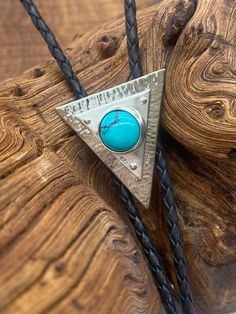 Luxury Silver Bolo Ties As Gift, Luxury Artisan Silver Bolo Tie, Western Style Lariat Jewelry As Gift, Western Lariat Jewelry As Gift, Western Style Lariat Jewelry For Gifts, Handmade Bohemian Bolo Tie, Handmade Festival Bolo Ties, Bohemian Turquoise Lariat Bolo Tie, Handmade Southwestern Bolo Ties