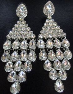 80s 90s Glam Huge Ice Glass Rhinestone Statement Earrings, Art Deco Showgirl Style Big Bold Bling, Glamour Wedding, Pageant Jewelry Trending big bling earrings 4.25 inches long! Extraordinary! Sparkle! In excellent collected vintage condition Arrives polished & gifted nicely 🎀 www.MySoulRepair.com an Etsy shoppe 🌿 www.MySoulRepair.NYC glamour jewelry & gifts Curated by marta michaud 🌸 Glamorous Rhinestone Clip-on Earrings For Wedding, Glamorous Wedding Clip-on Earrings With Bling, Glamorous Metal Crystal Earrings For Wedding, Glamorous Rhinestone Chandelier Earrings For Anniversary, Sparkling Metal Crystal Earrings For Wedding, Silver Rhinestone Clip-on Earrings For Party, Glamorous Jeweled Bridal Earrings For Party, Silver Jeweled Bridal Earrings For Celebration, Jeweled Metal Crystal Earrings For Wedding