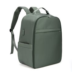 a green backpack on a white background with straps around the front and side pockets that are closed