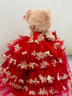 "Add a touch of glamour to your quinceañera celebration with Osito, the custom 23" Teddy bear dressed in a beautiful tulle dress with gold trim. Perfect for a special gift or decoration, Osito is sure to make your celebration even more memorable and unique." Gold Tulle Ball Gown For Quinceanera, Gold Ball Gown Dress For Quinceanera, Red Tulle Quinceanera Dress For Party, Gold Tulle Prom Gown, Gold Tulle Gown For Prom, Gold Princess Dress For Quinceanera, Gold Ball Gown For Quinceanera, Gold Ball Gown For Quinceanera Party, Gold Ball Gown Quinceanera Dress For Party