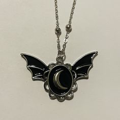 Bat Winged Enamel Moon Cameo Necklace Listing for 1 necklace Halloween Metal Necklace With Adjustable Chain, Gothic Jewelry With Pendant And Adjustable Chain, Black Halloween Jewelry With Adjustable Chain, Gothic Pendant Jewelry With Clavicle Chain, Vintage Black Clavicle Chain Necklace, Black Pendant Necklace For Halloween, Silver Pendant With Black Enamel, Black Enamel Round Metal Jewelry, Round Metal Jewelry With Black Enamel