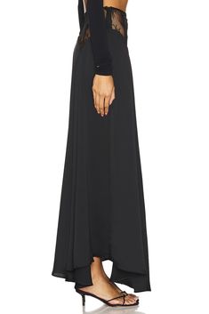 90% polyester 10% spandex.  Made in USA.  Dry clean only.  Unlined.  Hidden side zipper closure.  .  .  Skirt measures approx 41.5" in length.  .  .  .  .  .  .  .  . Asymmetrical Skirt With Side Zipper For Work, Workwear Asymmetrical Skirt With Side Zipper, Versatile Full Length Lined Skirt Bottoms, 4-way Stretch Flared Lined Skirt, Flared Lined Skirt With 4-way Stretch, Versatile Long Skirt With Lined Detail, Versatile Full-length Stretch Skirt, Solid 4-way Stretch Skirt, Flowy Elastane Maxi Skirt