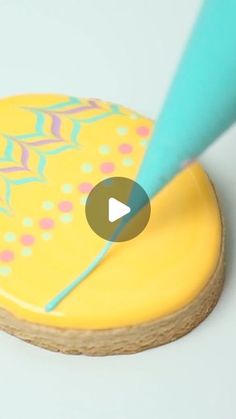 a video demonstrating how to make an ornament with fondant and colored paper