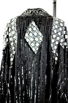 "Stunning Coat. Perfect for any Gatsby or Formal Event. The Sequins are amazing, the beads are spectacular, and the coat is fabulous!! This is all silk and all beautiful Excellent condition Measuring: 40\" length Width: 63\" 3/4 sleeves: 22\" Pet Free/smoke free Enjoy!" Elegant Sequined Outerwear For Festive Season, Elegant Beaded Festive Outerwear, Glamorous Beaded Outerwear For Evenings, Glamorous Beaded Evening Outerwear, Long Duster, Long Jacket, Sequin Beading, Sequin Top, Just Amazing